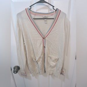 White/ Cream color cardigan with rainbow outline.